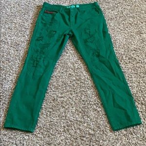 Born fly green ripped jeans/ red striped pockets
